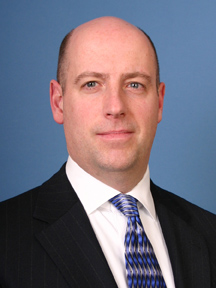 Joe McHugh, former Navy officer and EY Executive Director